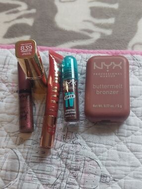 NYX Buttermelt Bronzer with Assorted Pink and Brown Lip Glosses
